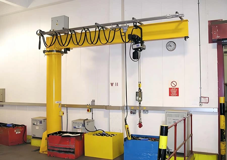 Pillar mounted jib crane in a workshop Pillar mounted jib crane in a workshop